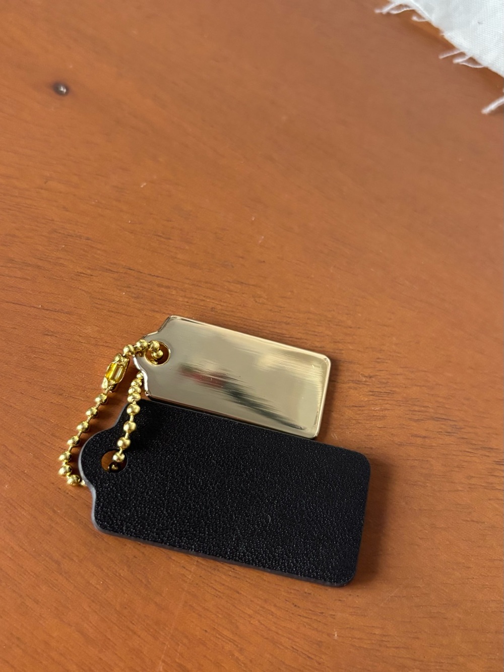 Coach Black Leather and Gold-Tone Metal Tag Keychain - Picture 6 of 6
